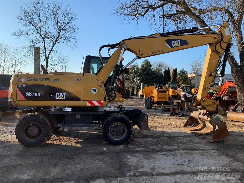 CAT M 318 D  휠 굴삭기