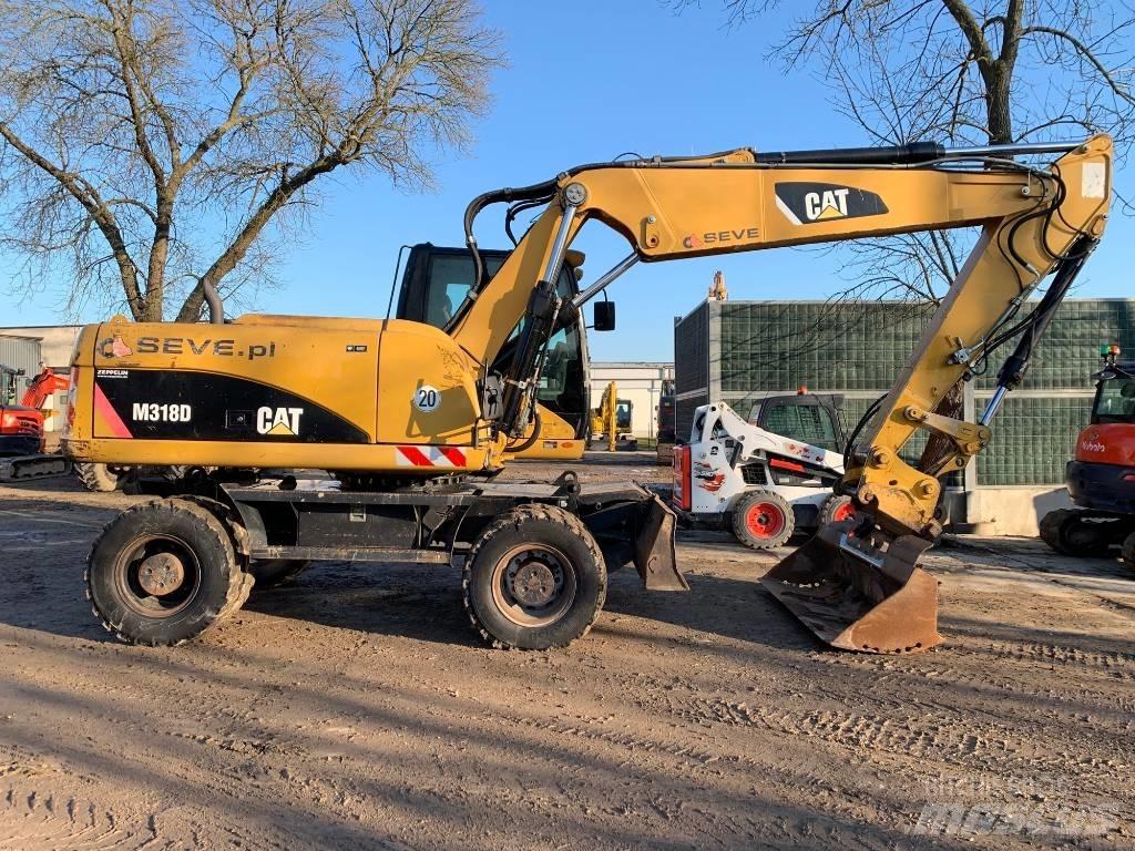 CAT M 318 D  휠 굴삭기