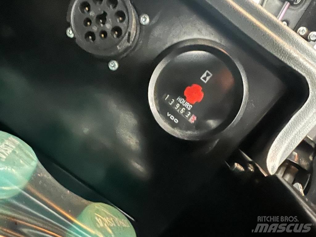 John Deere 1010 E 원목 포워더