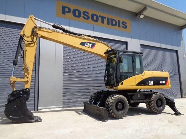 CAT M 318 D  휠 굴삭기