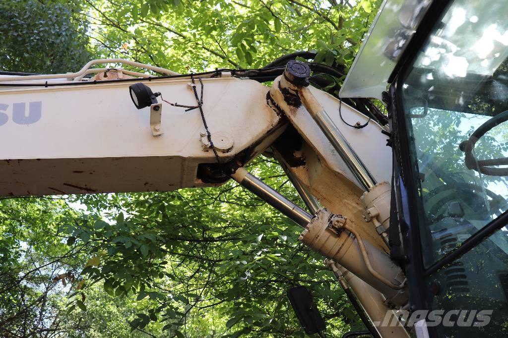 Komatsu PW 140-7 백호로더