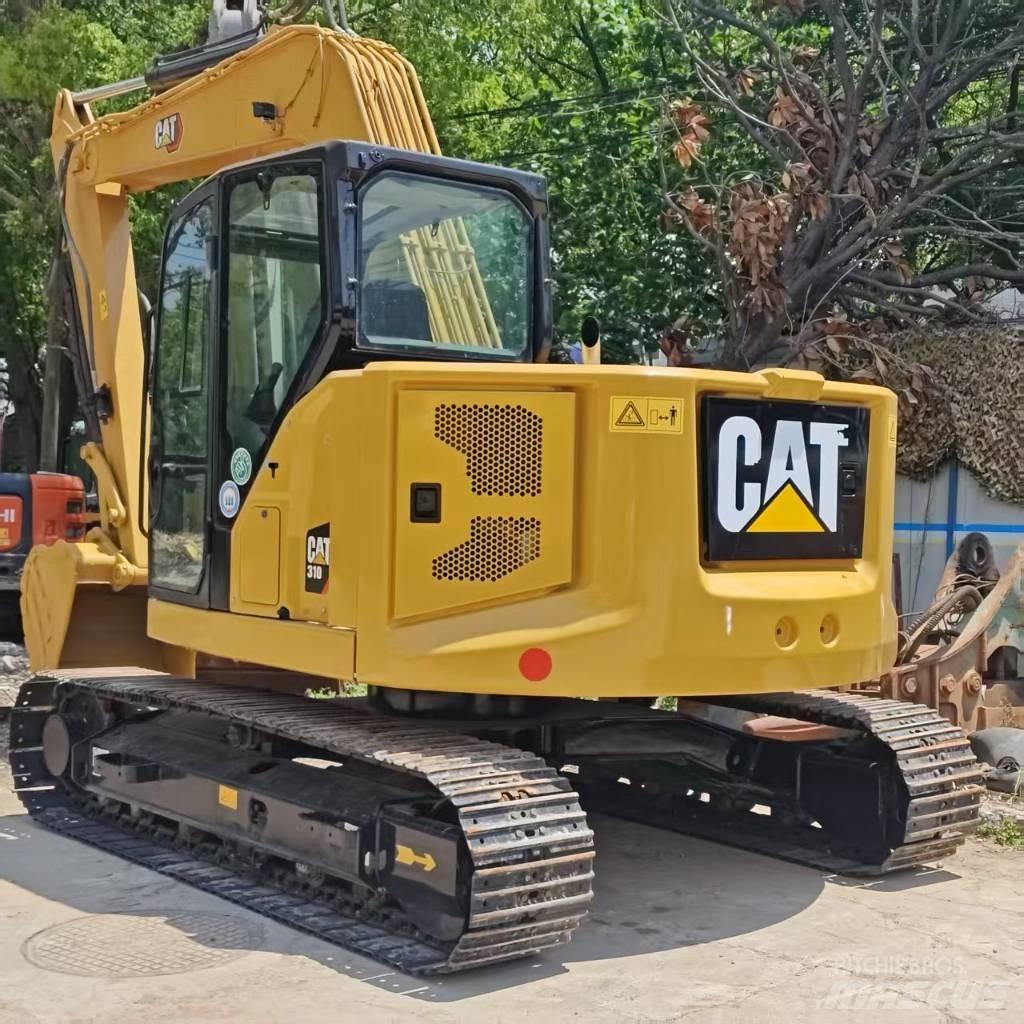 CAT 310 중형굴삭기 7톤-28톤