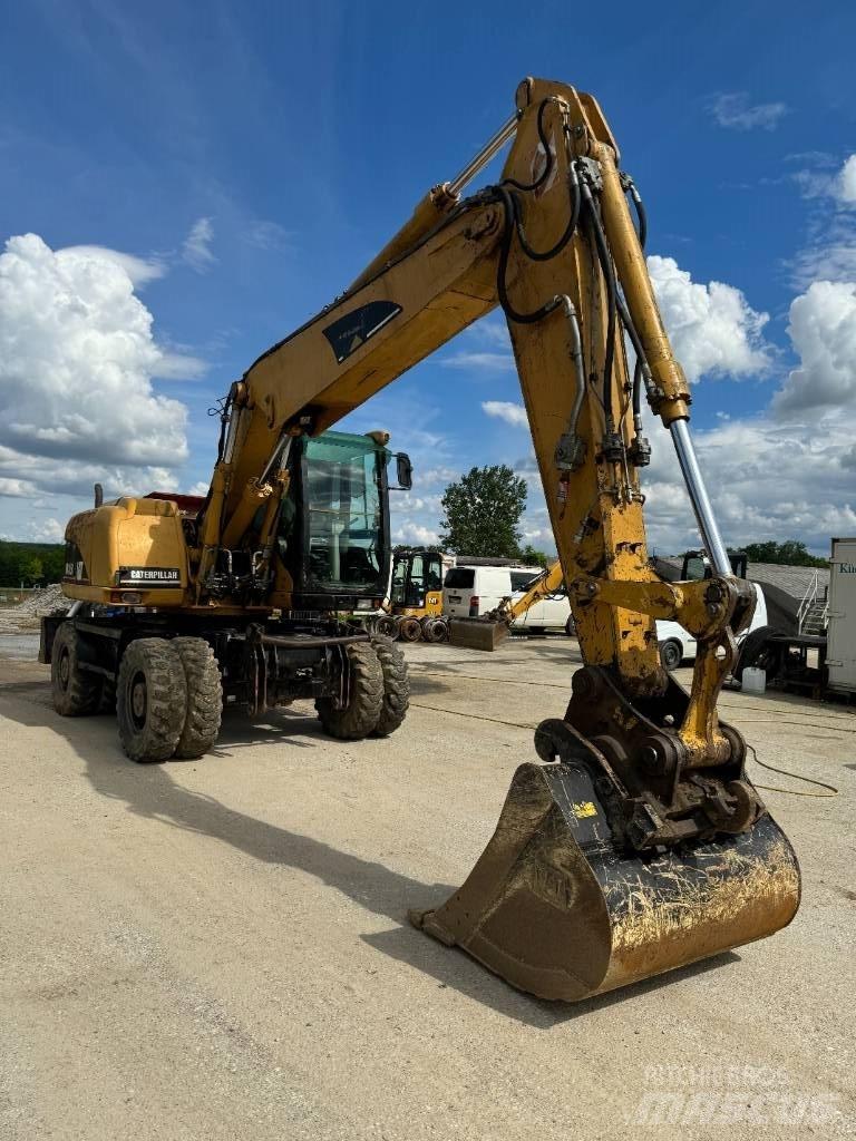 CAT 315 C  휠 굴삭기