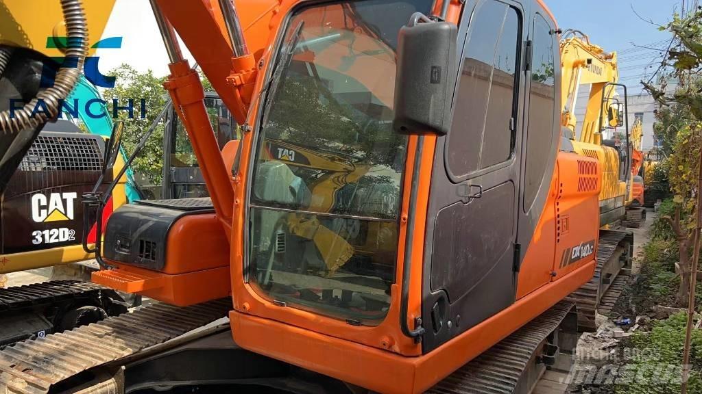 Doosan DX 140 LC  휠 굴삭기