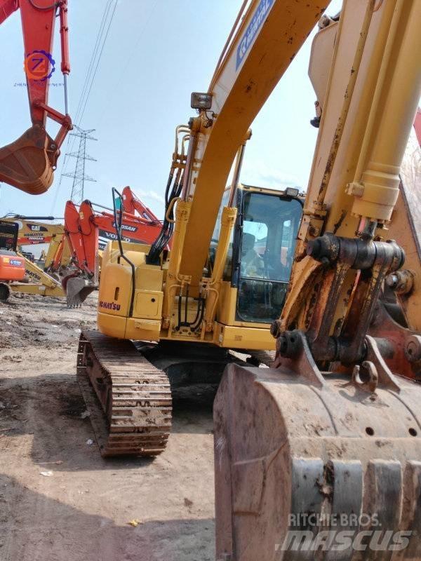 Komatsu PC 128 US 중형굴삭기 7톤-28톤