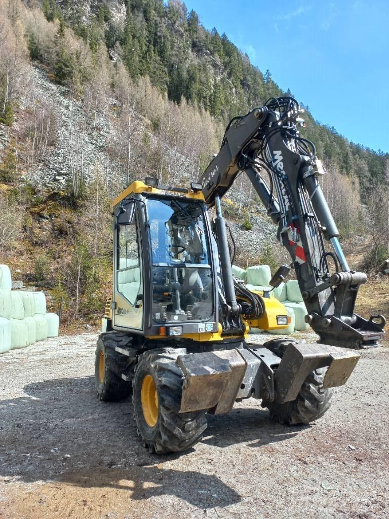 Mecalac 12 M XT 백호로더
