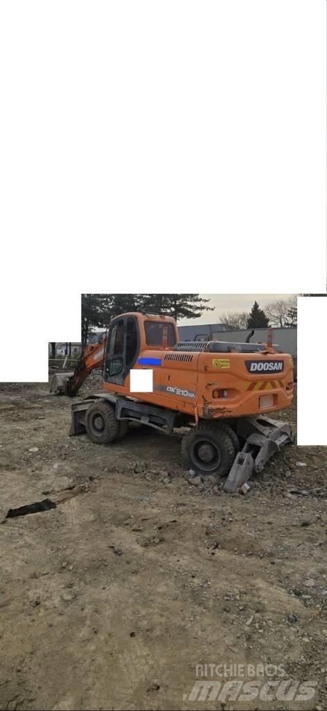 Doosan DX 210 W  휠 굴삭기