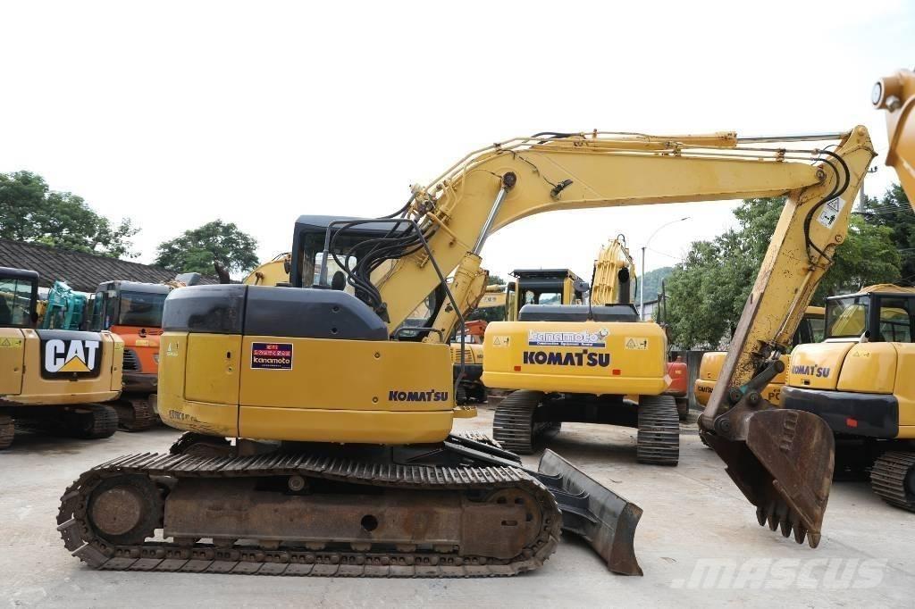 Komatsu PC 128 US 중형굴삭기 7톤-28톤