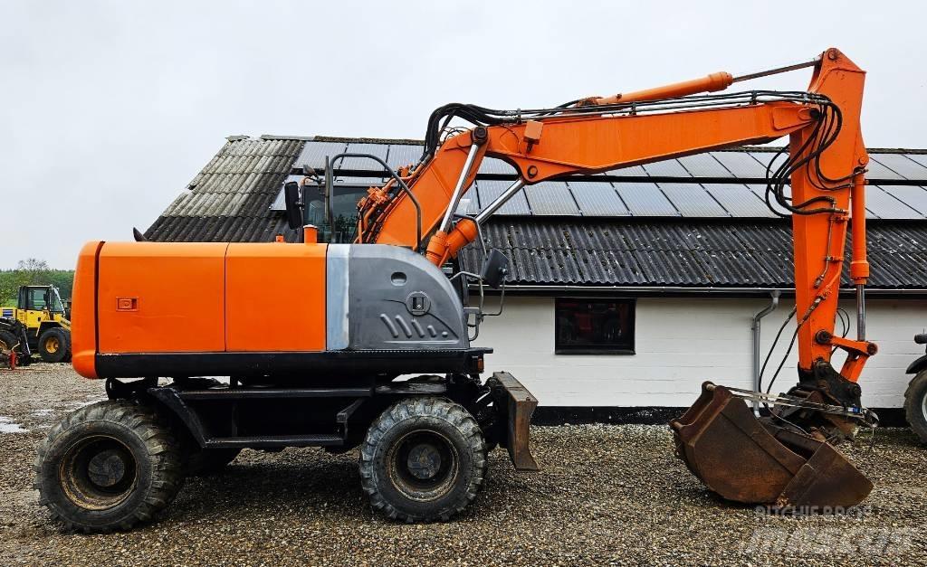 Hitachi ZX 140 W-3  휠 굴삭기