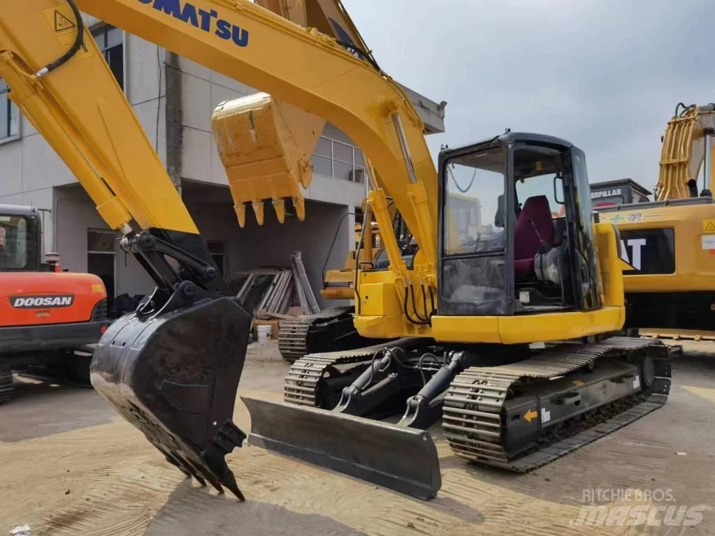 Komatsu PC 128US 중형굴삭기 7톤-28톤