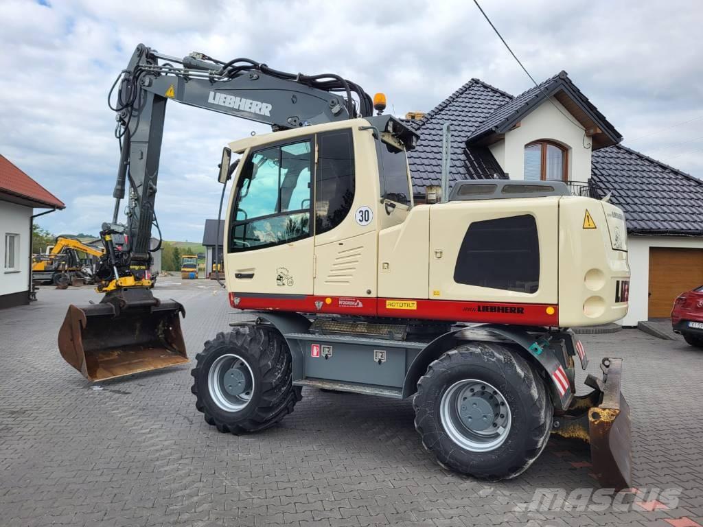 Liebherr 916  휠 굴삭기