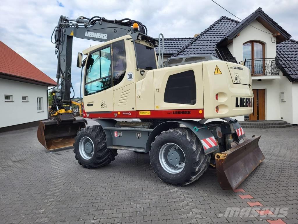 Liebherr 916  휠 굴삭기