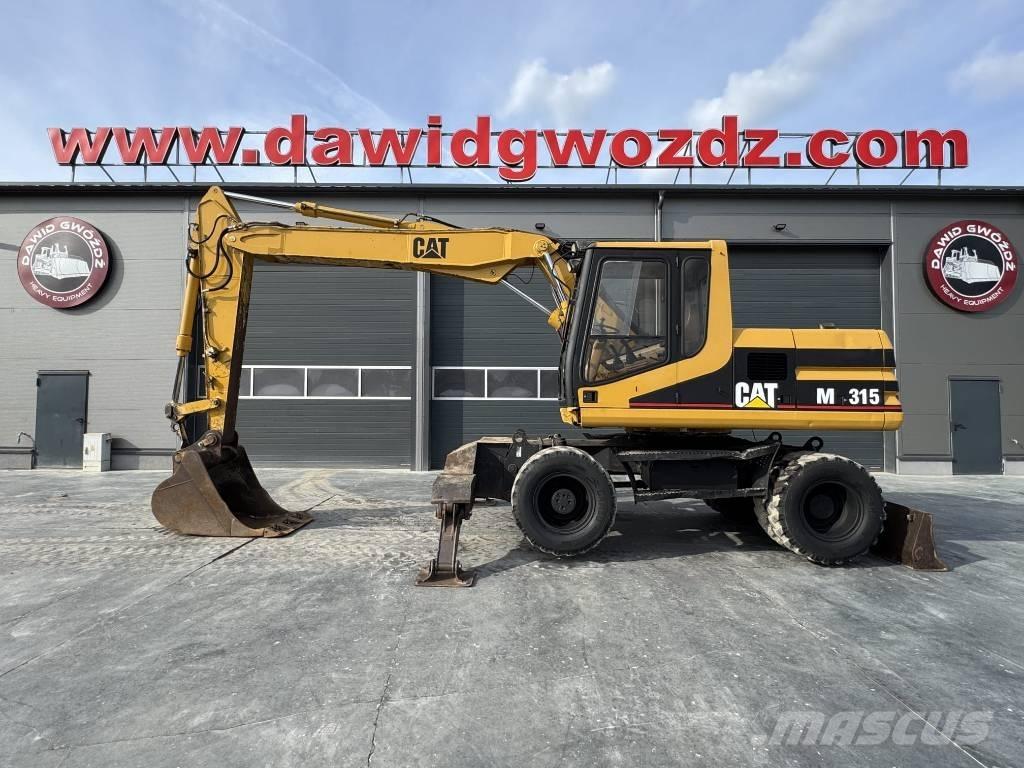 CAT M 315  휠 굴삭기