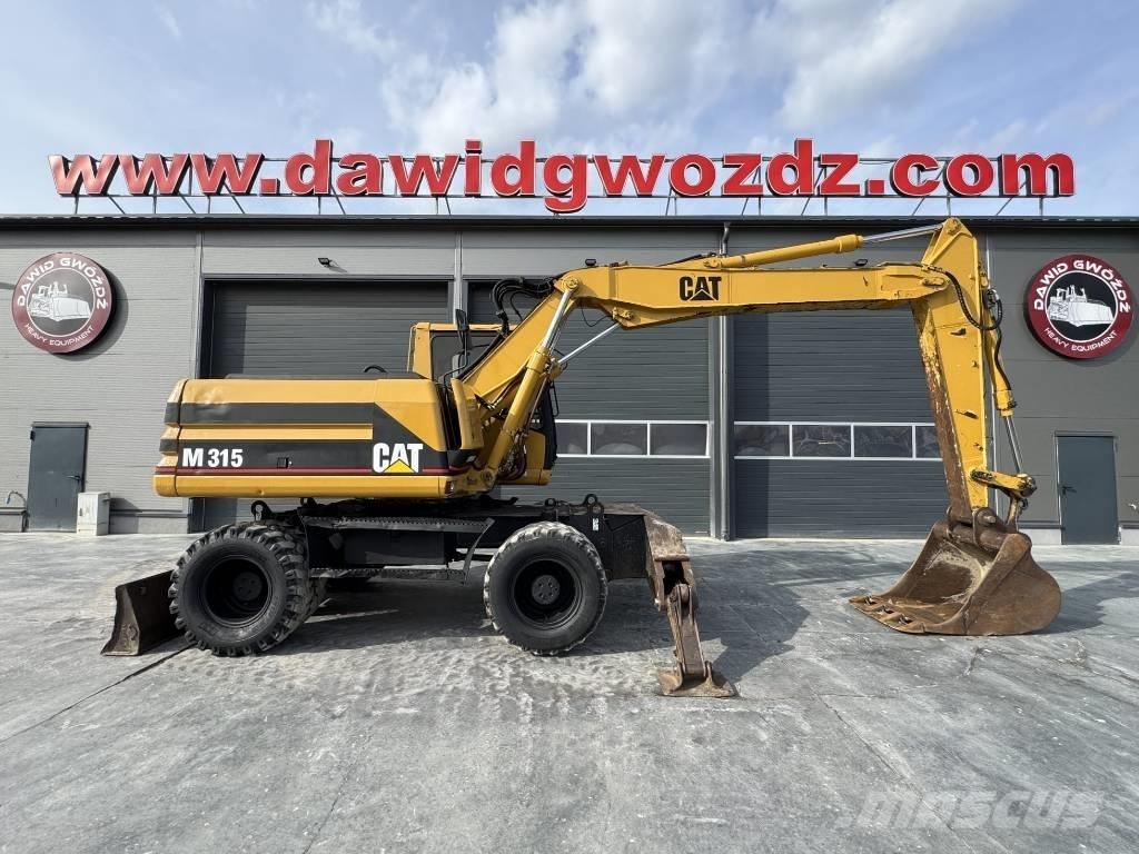 CAT M 315  휠 굴삭기