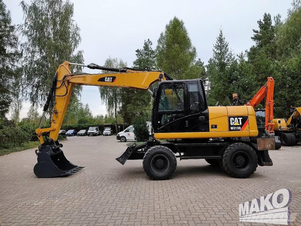 CAT M 313 D  휠 굴삭기