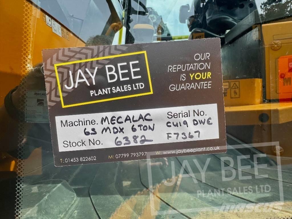 Mecalac 6 MDX 건설현장 덤프트럭