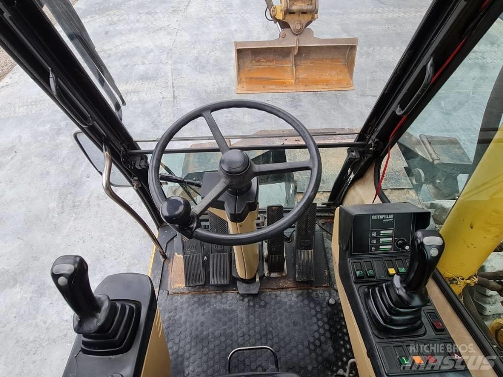 CAT M 312  휠 굴삭기