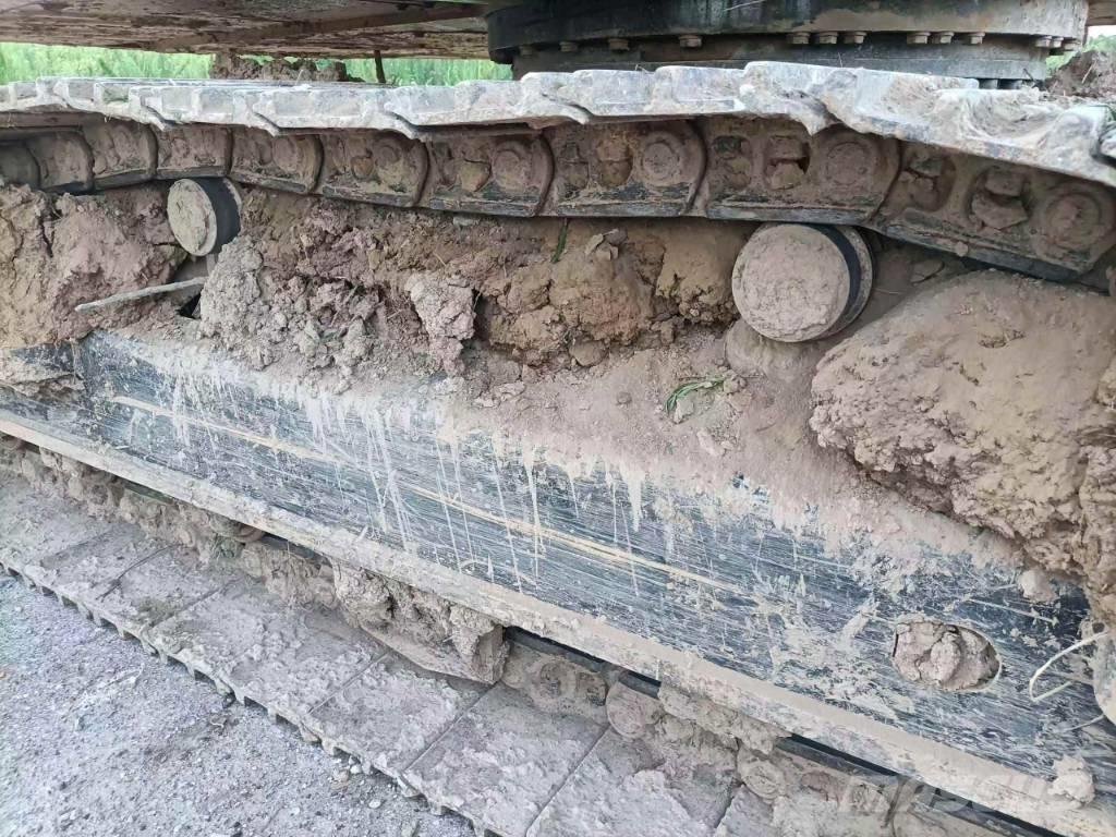 CAT 323GX 수륙양용 굴삭기