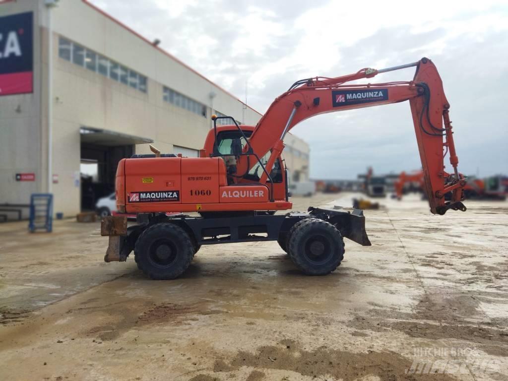 Doosan DX 140 W  휠 굴삭기