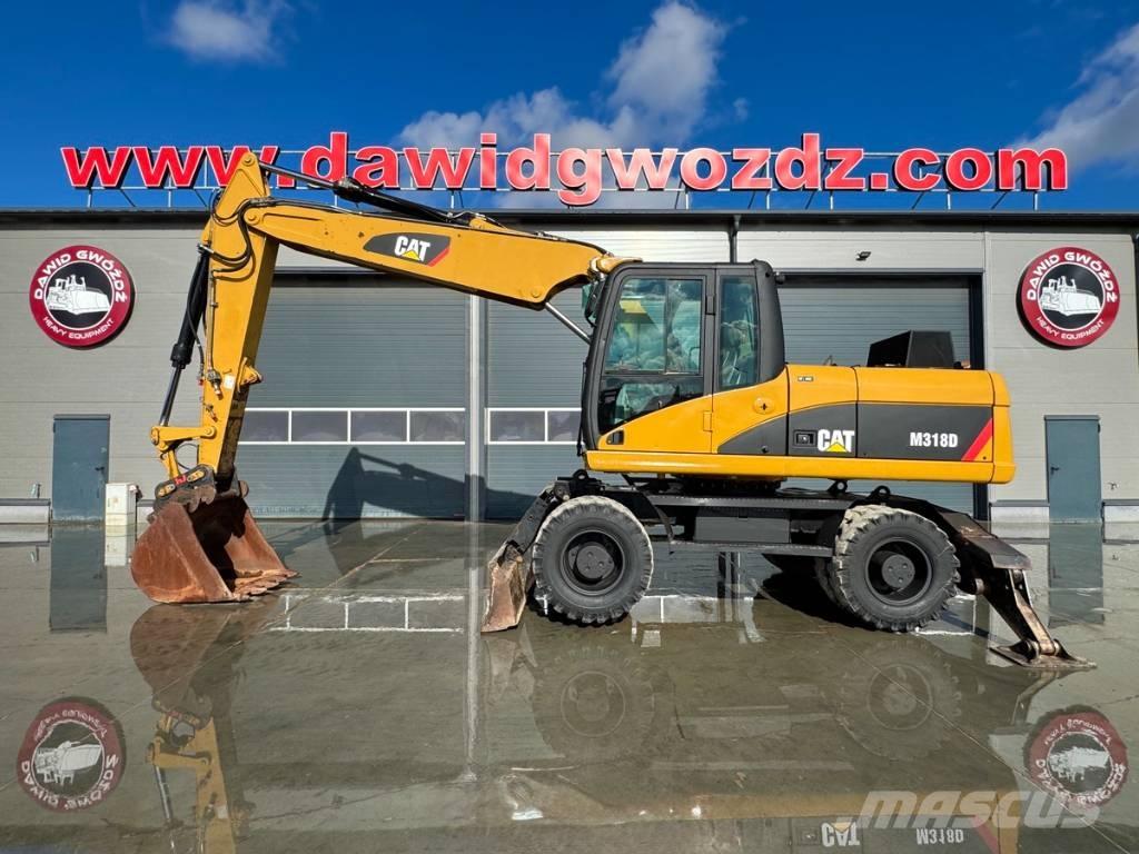 CAT M 318 D  휠 굴삭기