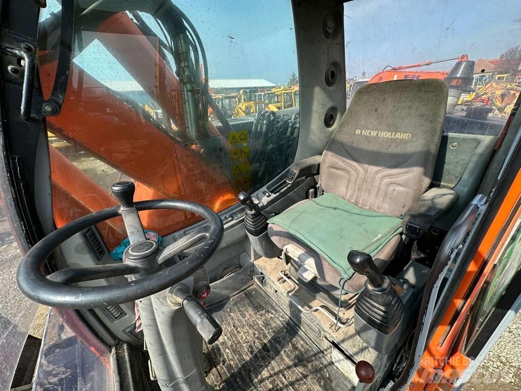 New Holland MH Plus  휠 굴삭기