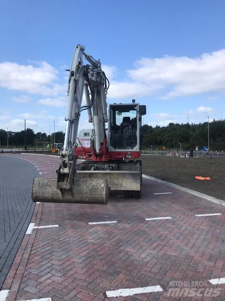 Takeuchi TB295W  휠 굴삭기