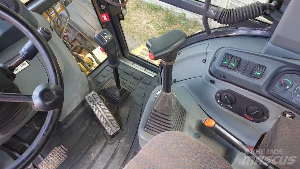 New Holland LB 110 백호로더