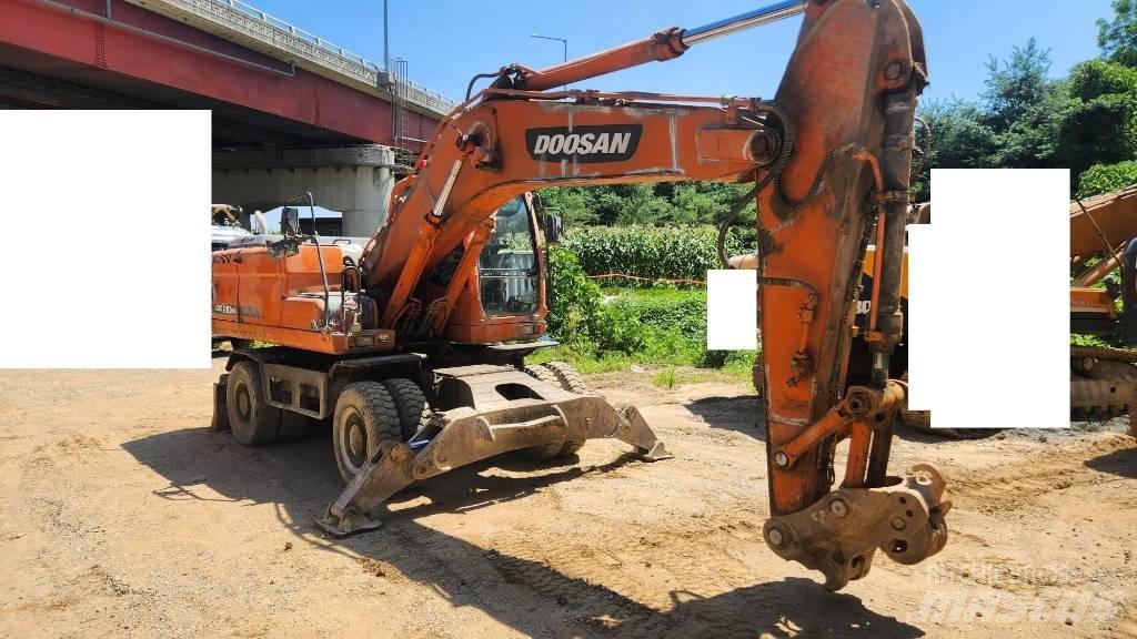 Doosan DX210WA  휠 굴삭기