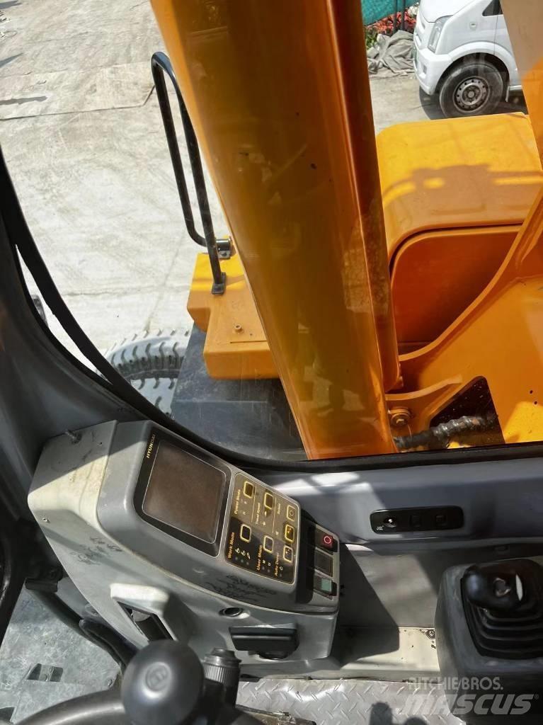 Hyundai 210W-7  휠 굴삭기