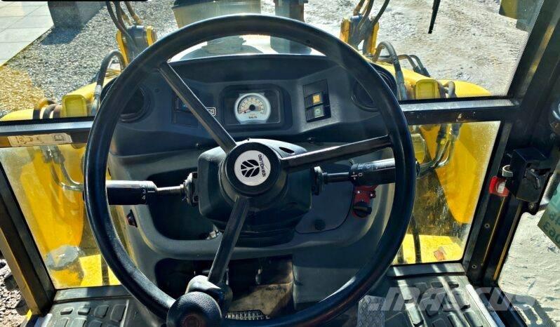 New Holland B 115 백호로더