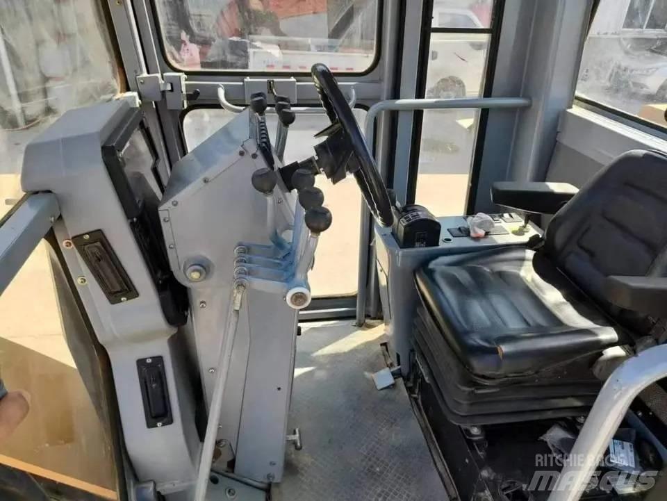 CAT 140K 그레이더