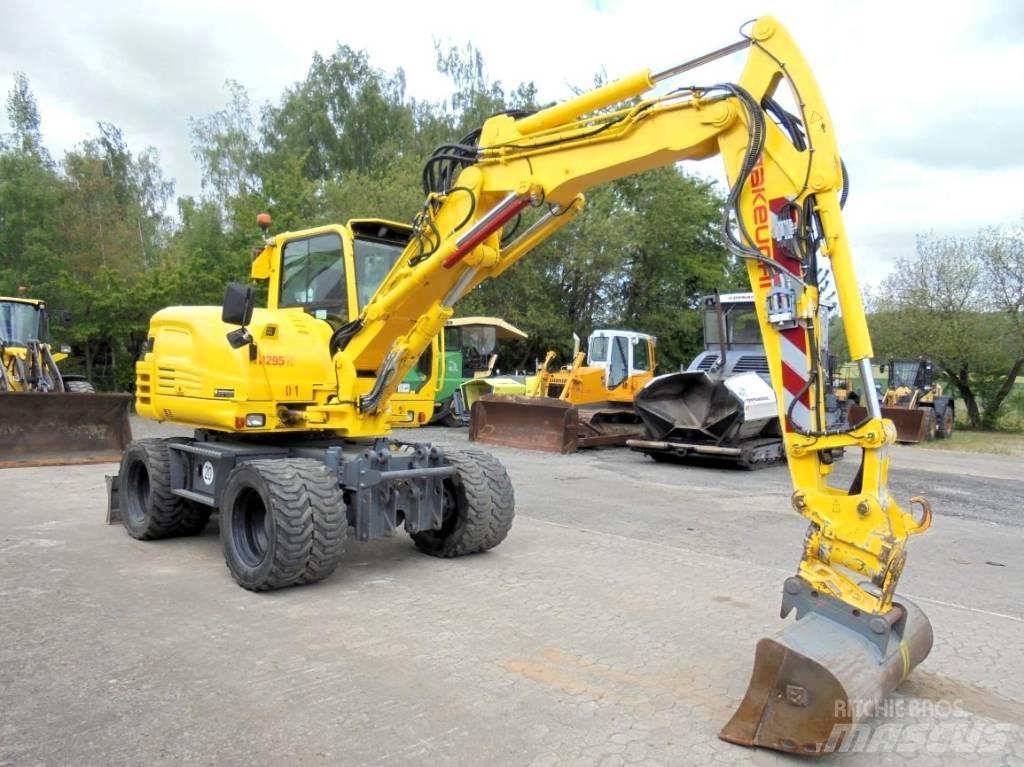 Takeuchi TB 295 W-2  휠 굴삭기