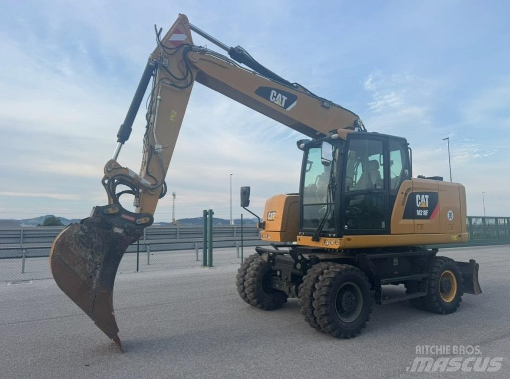 CAT M 318 F  휠 굴삭기