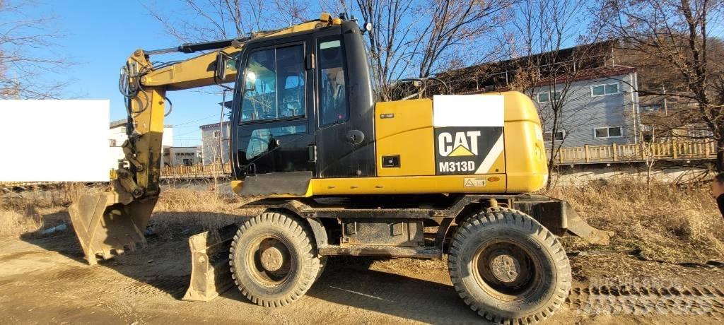 CAT M 313 D  휠 굴삭기