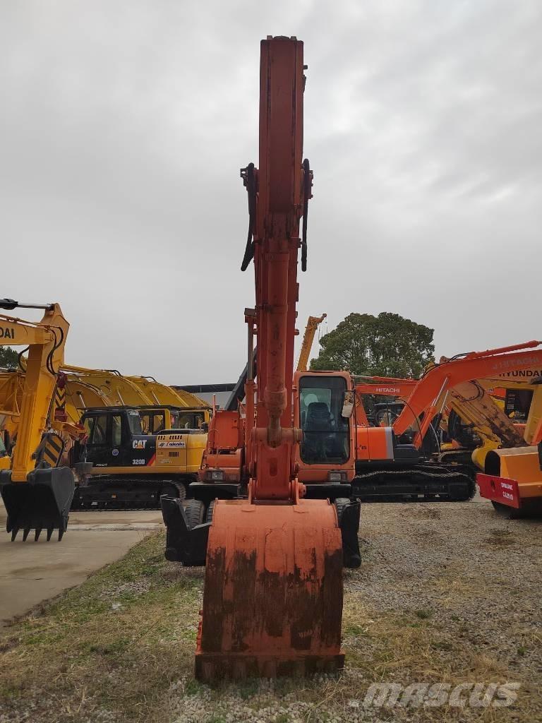 Doosan DH 210 W-7  휠 굴삭기