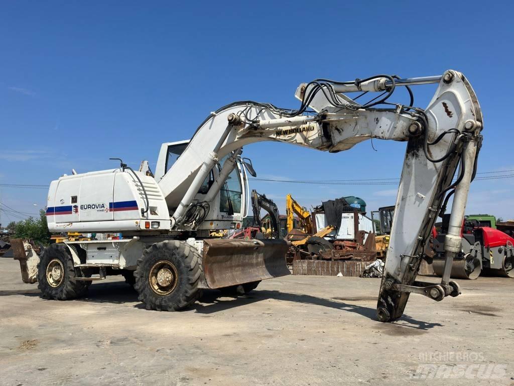 New Holland MH Plus  휠 굴삭기