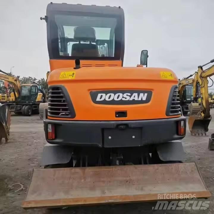 Doosan DX60W  휠 굴삭기