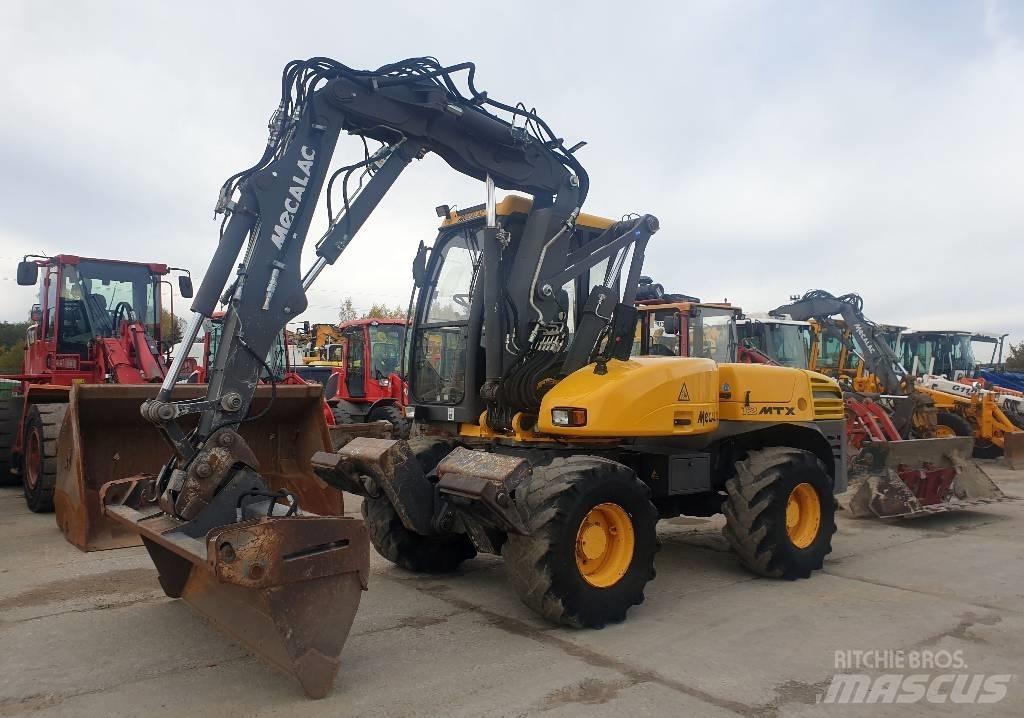 Mecalac 12 M TX  휠 굴삭기