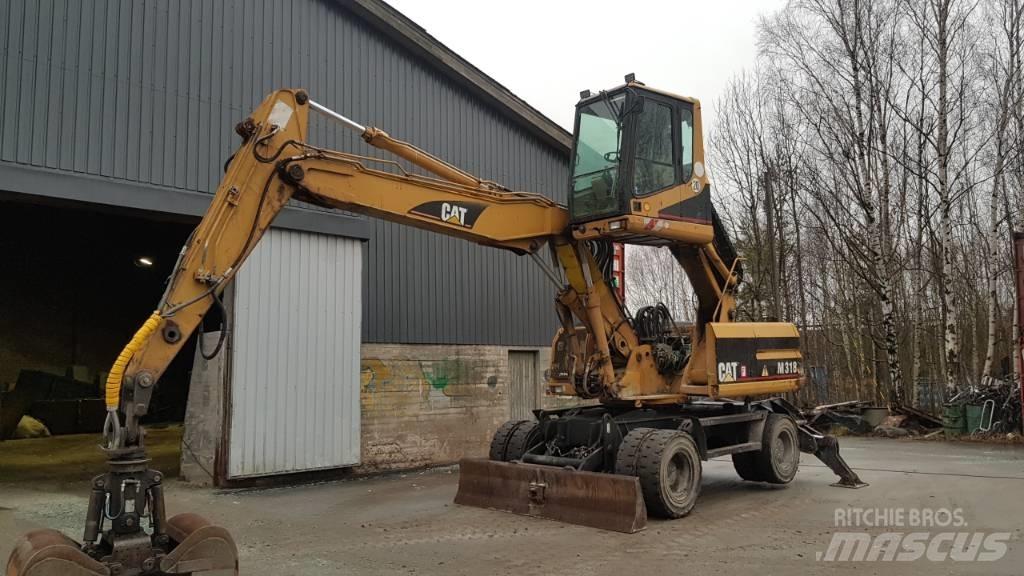 CAT M 318 폐기물/산업 처리기