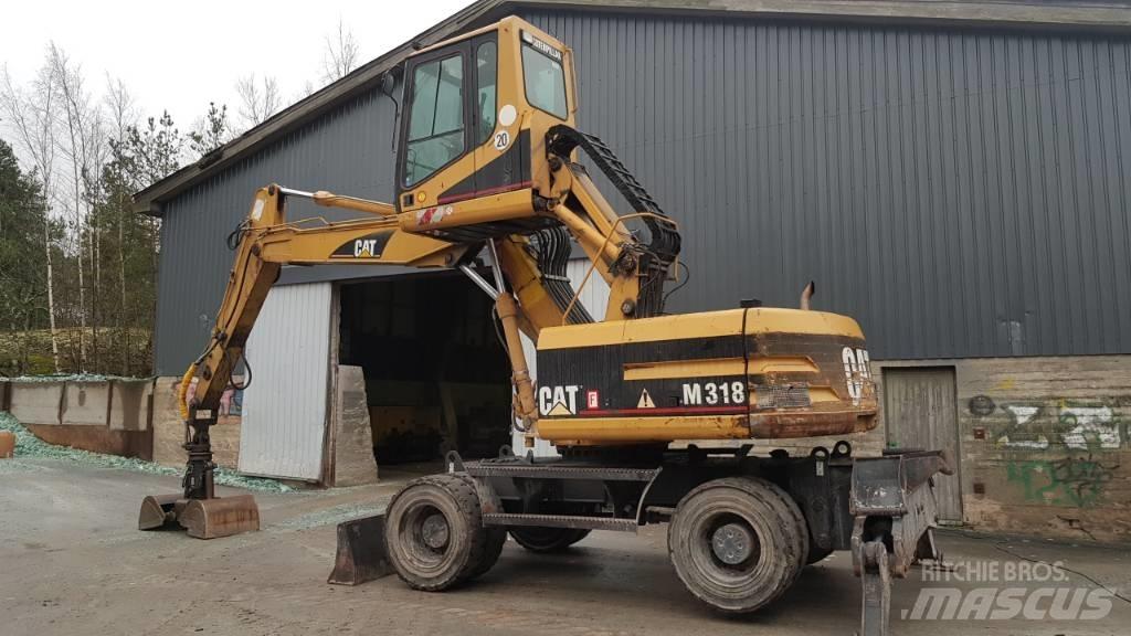 CAT M 318 폐기물/산업 처리기