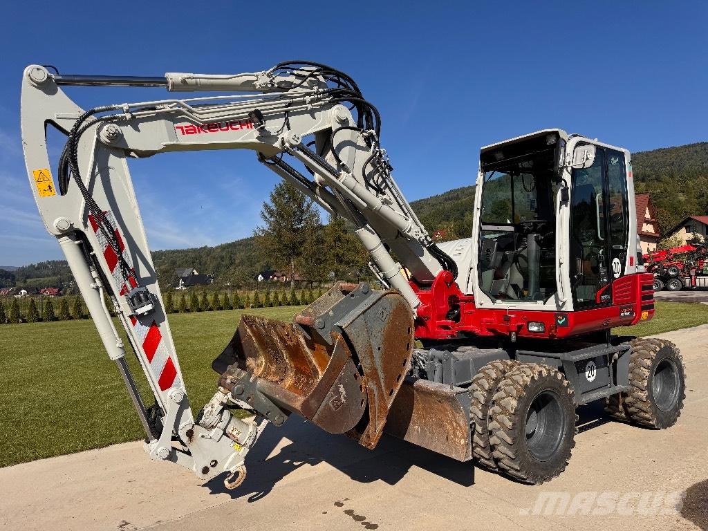 Takeuchi TB 295 W  휠 굴삭기