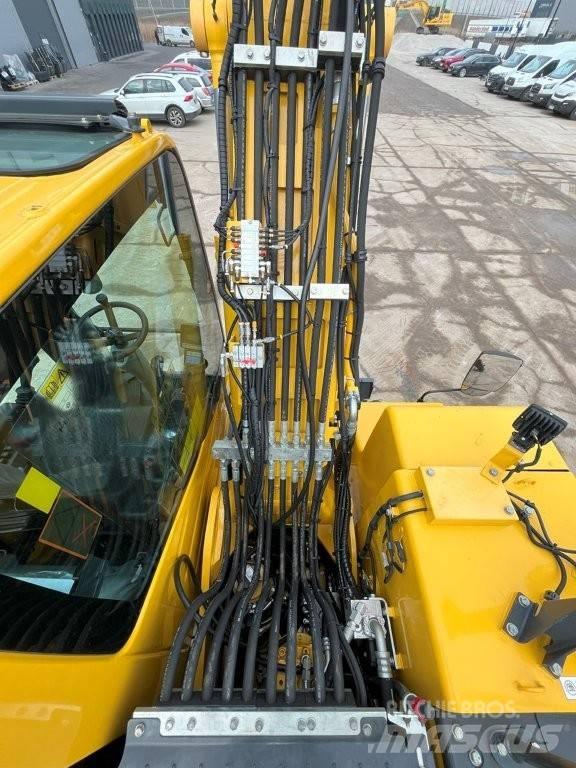 Komatsu PW160-11  휠 굴삭기