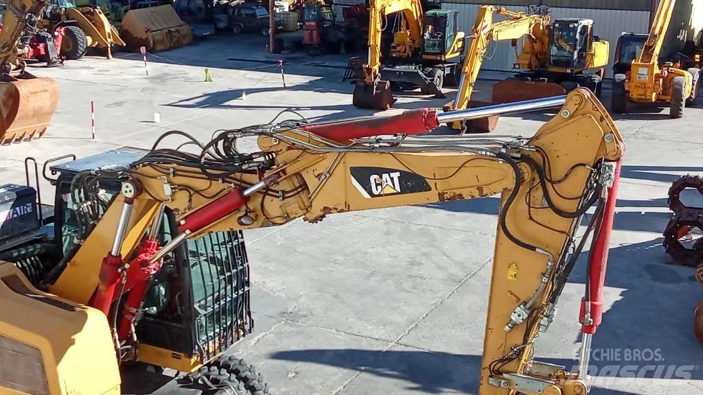 CAT M318F  휠 굴삭기