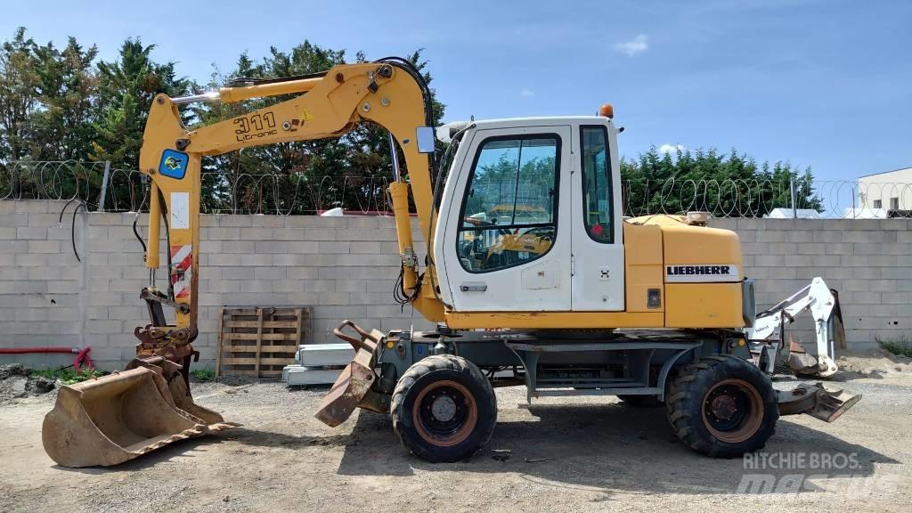 Liebherr A 311  휠 굴삭기