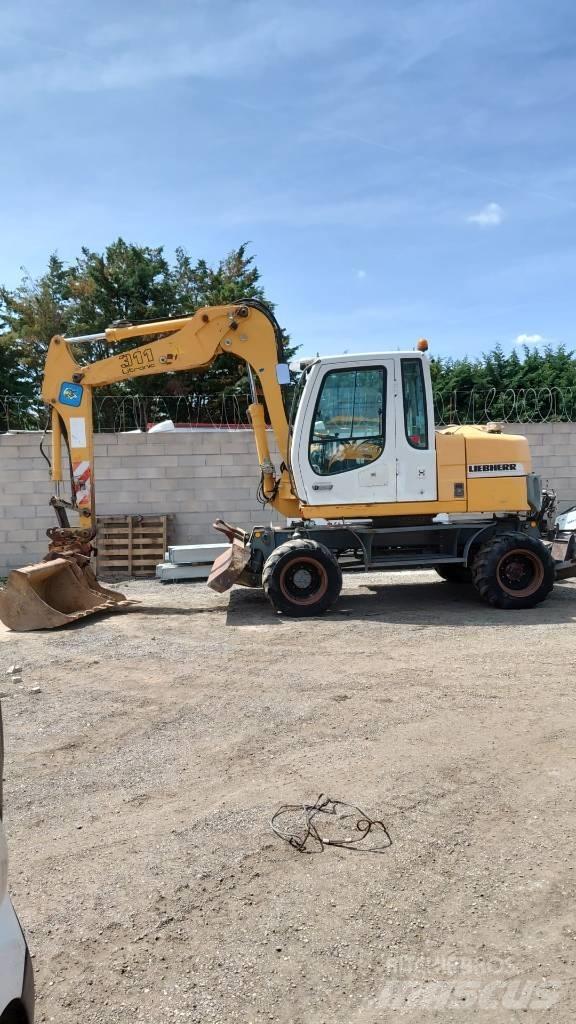 Liebherr A 311  휠 굴삭기