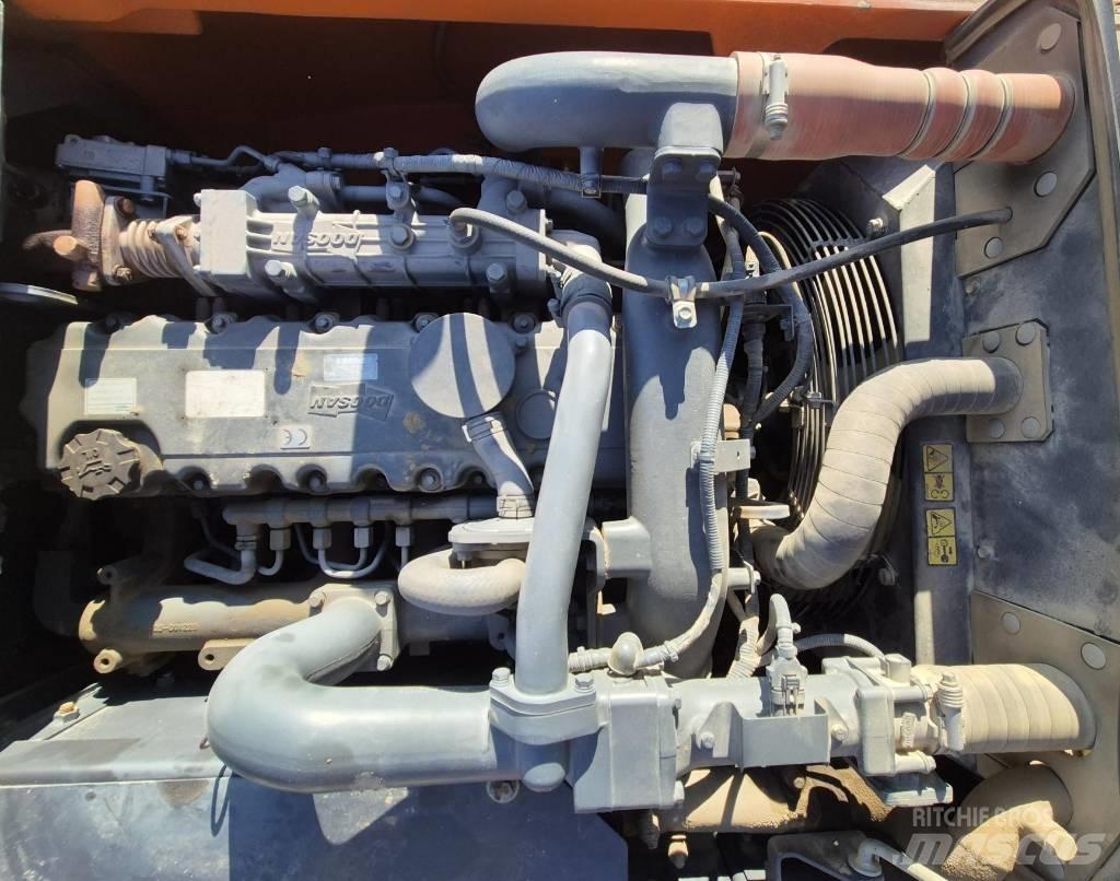 Doosan DX 140 W  휠 굴삭기