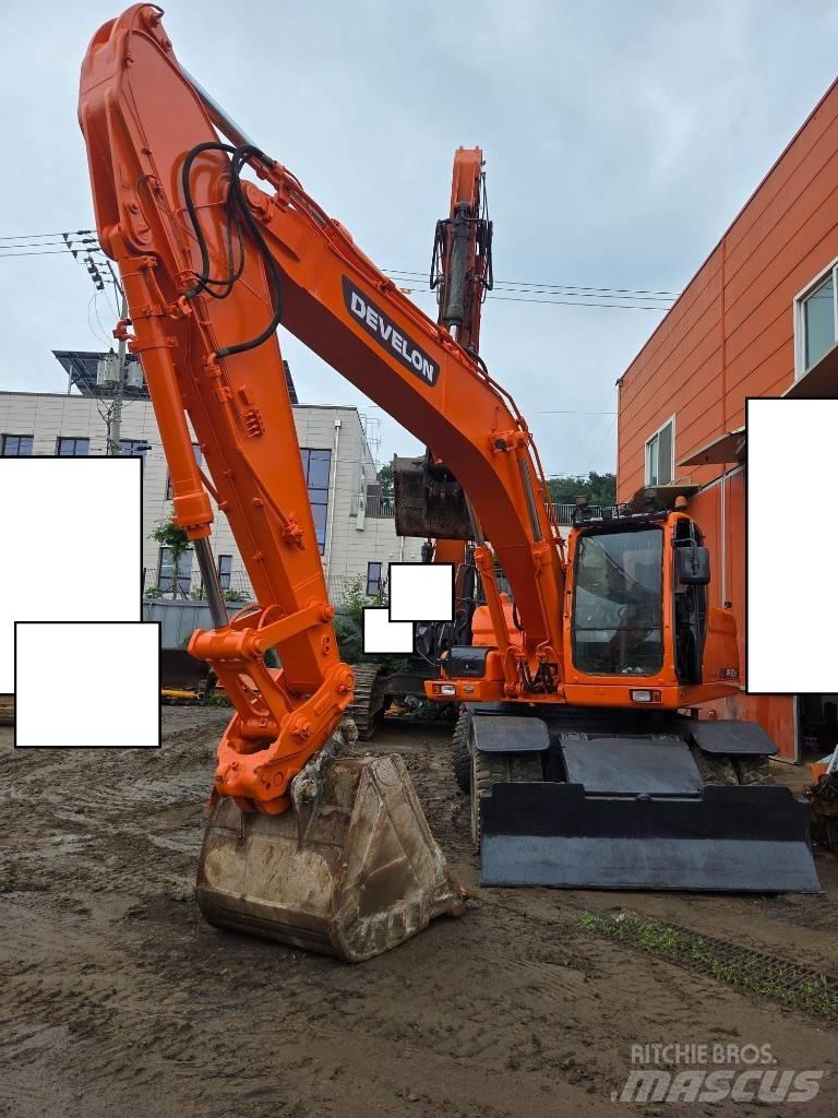 Doosan DX 210 W  휠 굴삭기