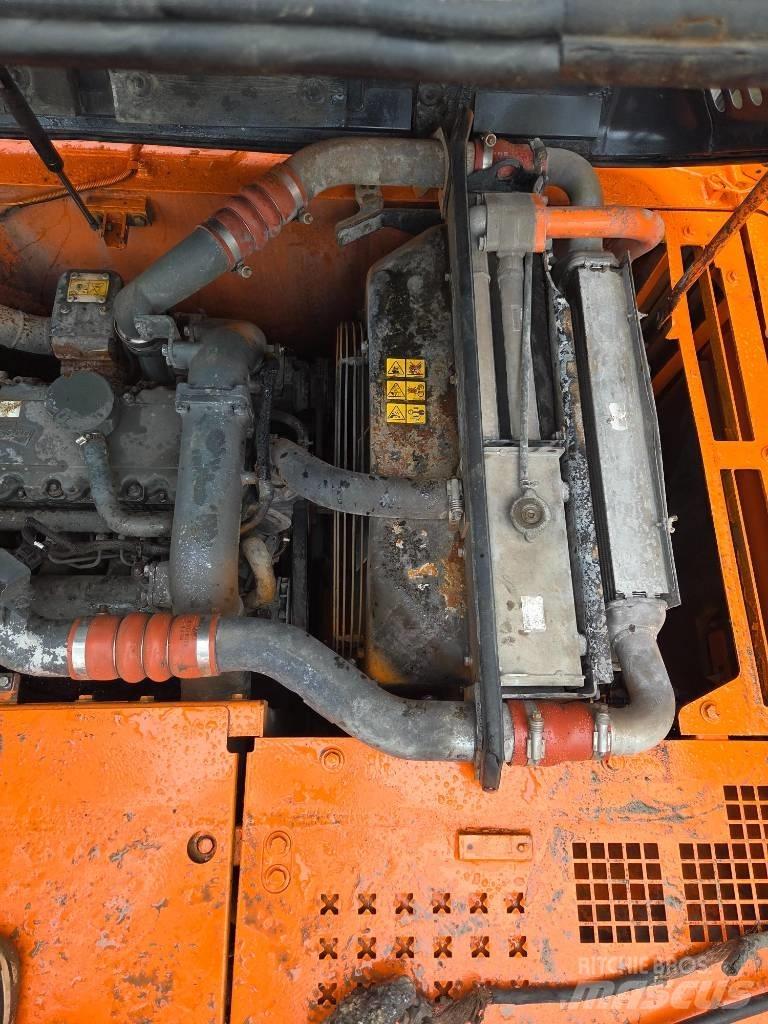 Doosan DX 210 W  휠 굴삭기