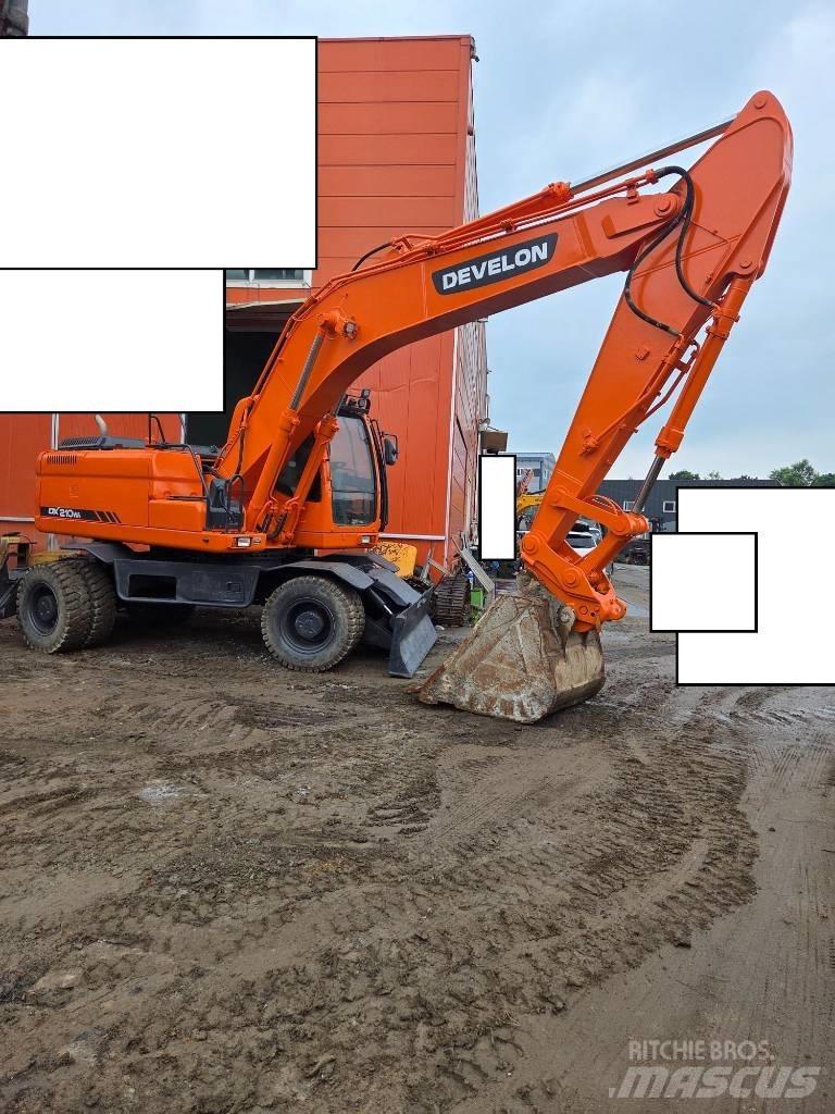Doosan DX 210 W  휠 굴삭기