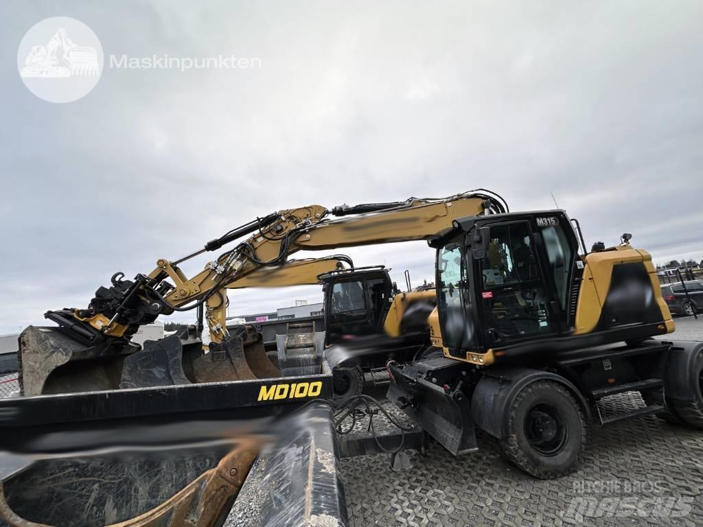 CAT M 315  휠 굴삭기